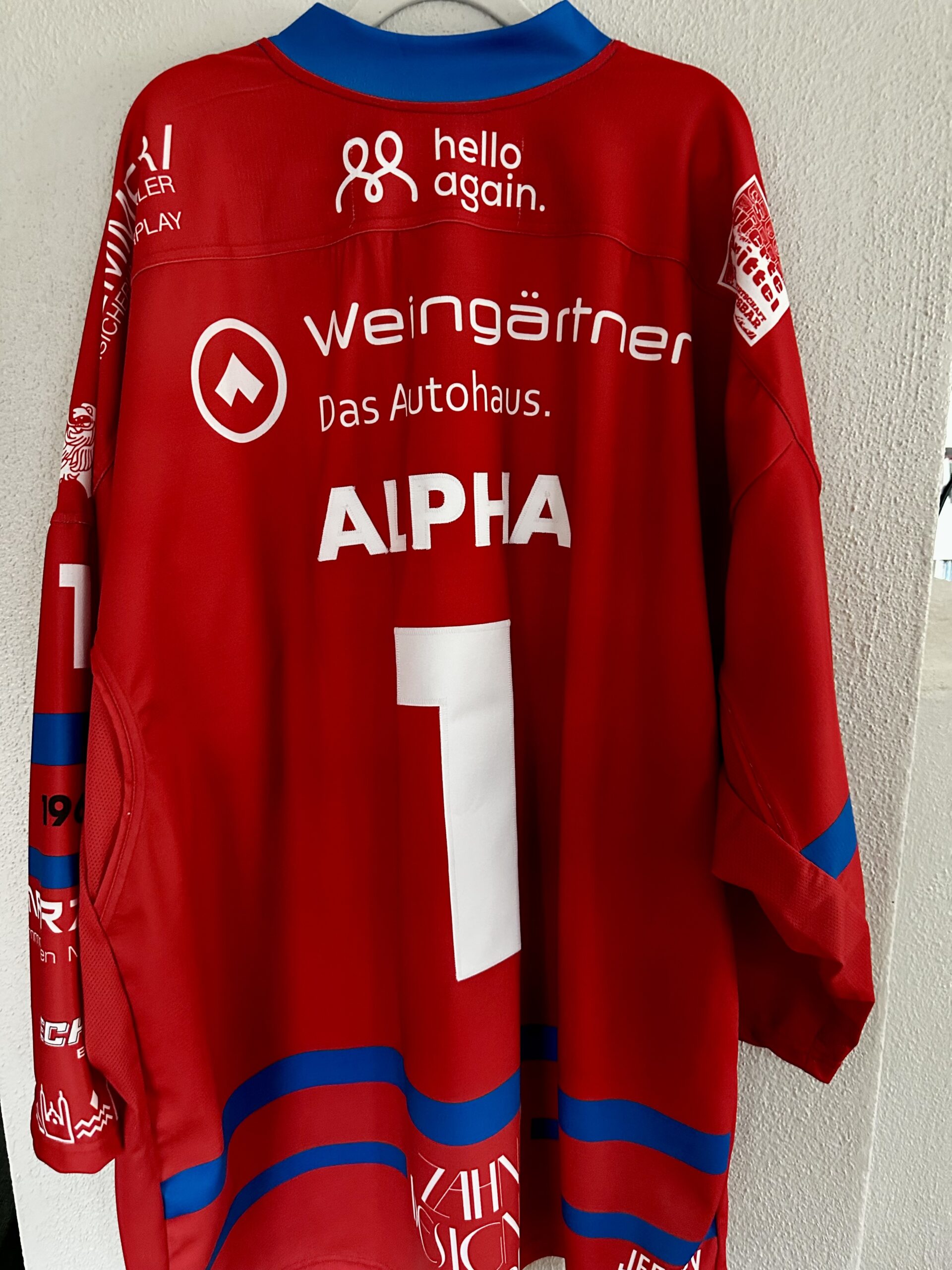 ECT: Original Spieler-Trikot Tölzer Löwen – 60 Jahre deutscher Meister – Home. #57, Niklas Alpha, Größe GXXL.