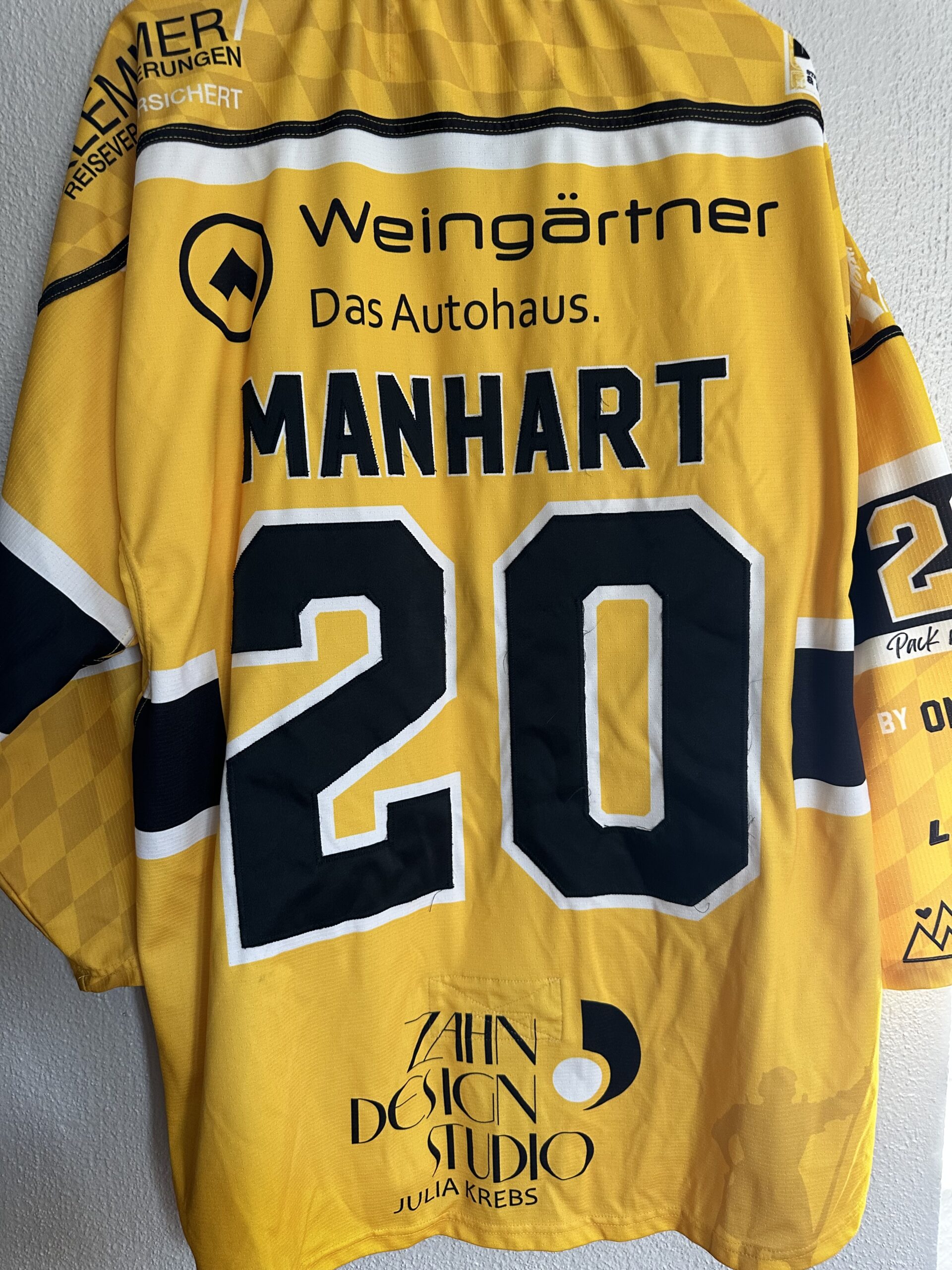 ECT: Original Spieler-Trikot Tölzer Löwen - Auswärtstrikot 25/26. #20, Simon Manhart, Größe XL.